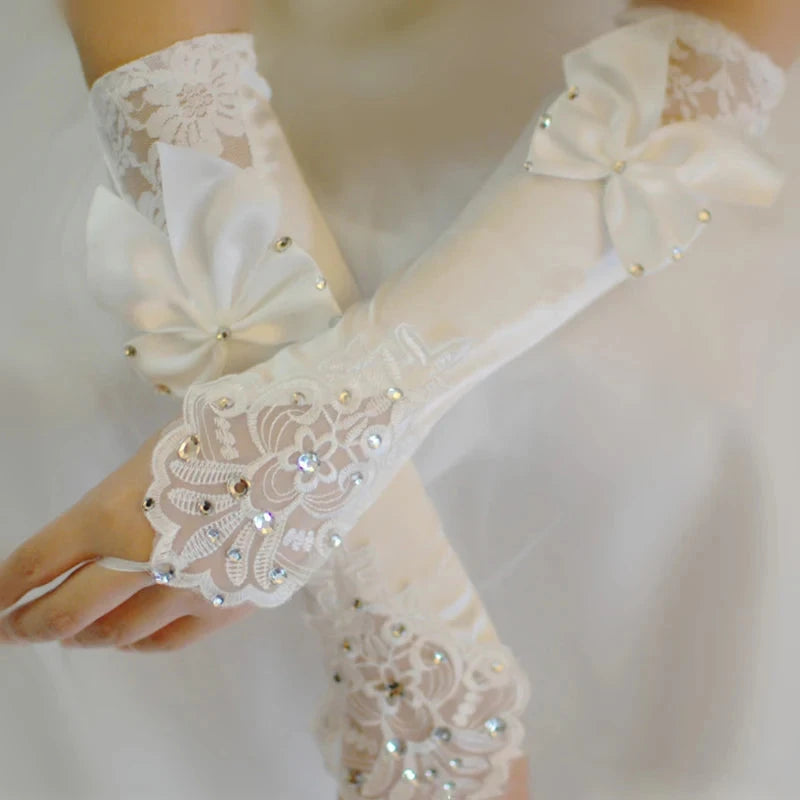 Elegant Ivory Lace Bridal Gloves with Rhinestone Bowknot GlowCart