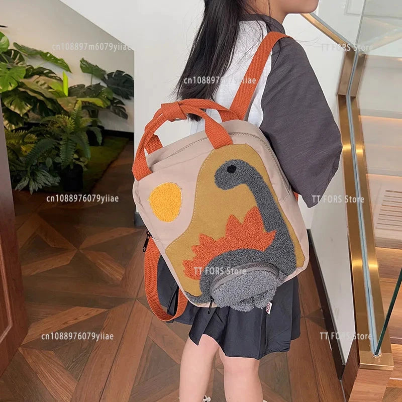New Style Cartoon Dinosaur Fashion Children's Backpack Cartoon Canvas Kindergarten Boys and Girls Schoolbag Birthday Gift GlowCart